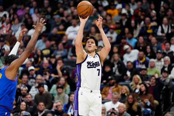 Jan 23, 2025; Denver, Colorado, USA; Sacramento Kings forward Doug McDermott (7) shoots the ball in the second half against the Denver Nuggets at Ball Arena. Mandatory Credit: Ron Chenoy-Imagn Images  