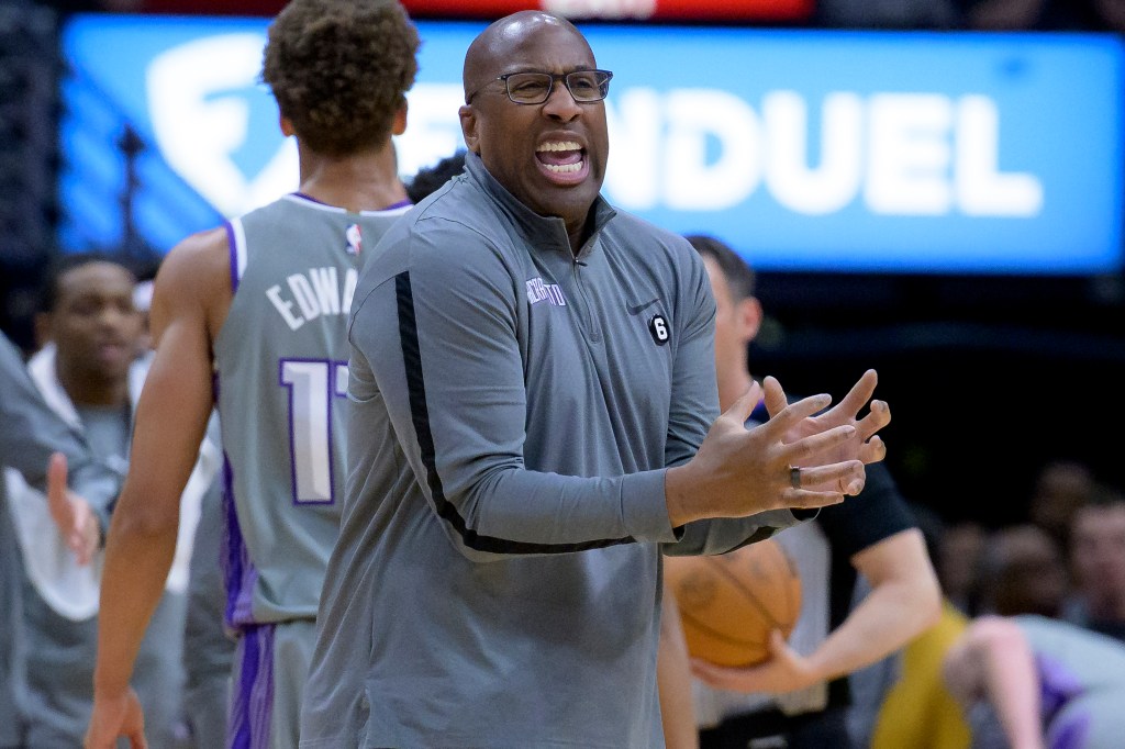 Sacramento Kings head coach Mike Brown coaching during a game.