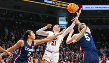 Kamilla Cardoso receives her AmeriCup MVP trophy