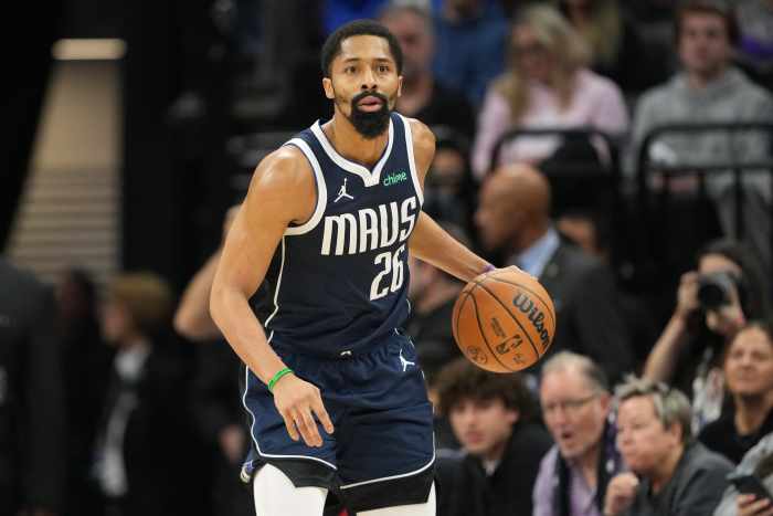 Dec 30, 2024; Sacramento, California, USA; Dallas Mavericks guard Spencer Dinwiddie (26) dribbles against the Sacramento Kings during the fourth quarter at Golden 1 Center. Mandatory Credit: Darren Yamashita-Imagn Images  
