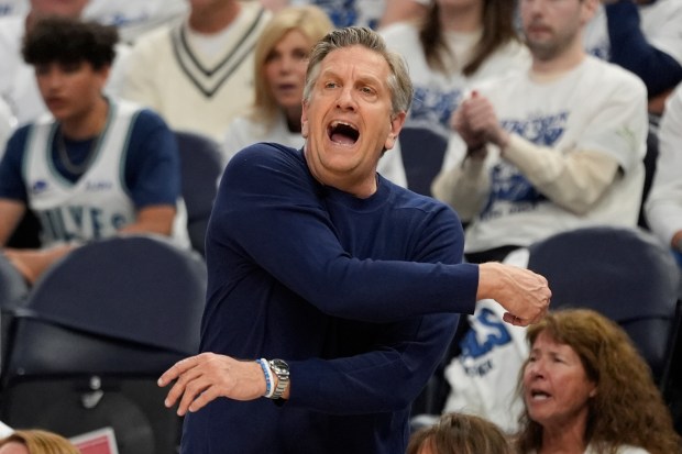 Minnesota Timberwolves head coach Chris Finch yells from the sideline during the second half of Game 3 of the Western Conference finals of the NBA basketball playoffs against the Oklahoma City Thunder, Saturday, May 24, 2025, in Minneapolis. (AP Photo/Abbie Parr)