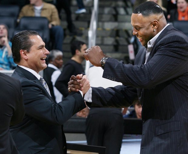2014: Former Orlando Magic player Horace Grant, right, shakes hands...