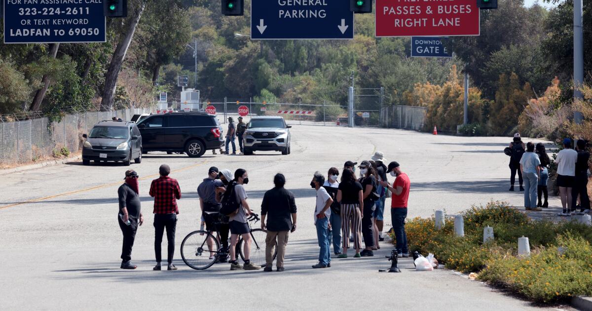 Letters: What a week, from ICE at Dodger Stadium to Lakers sale