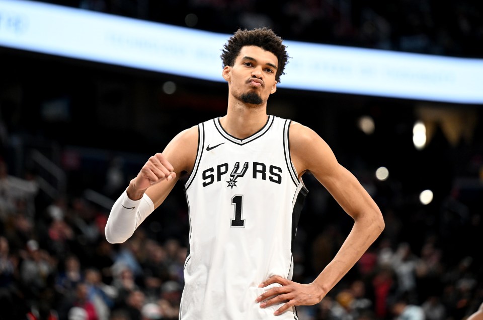 Victor Wembanyama #1 of the San Antonio Spurs celebrates a victory.