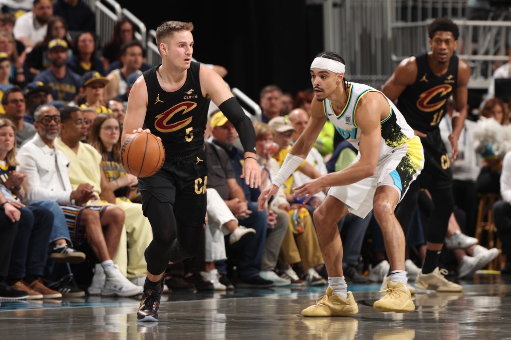 Sam Merrill #5 of the Cleveland Cavaliers dribbles the ball during the game against the Indiana Pacers during Round 2 Game 3 of the 2025 NBA Playoffs on May 11, 2025 at Gainbridge Fieldhouse in Indianapolis, Indiana. 