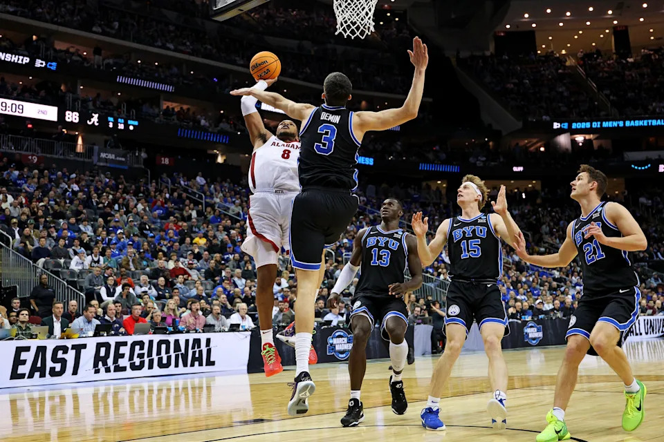 Mar 27, 2025; Newark, NJ, USA; Alabama Crimson Tide guard Chris Youngblood (8) shoots the ball against Brigham Young Cougars guard Egor Demin (3) during the second half during an East Regional semifinal of the 2025 NCAA tournament at Prudential Center. Mandatory Credit: Vincent Carchietta-Imagn Images