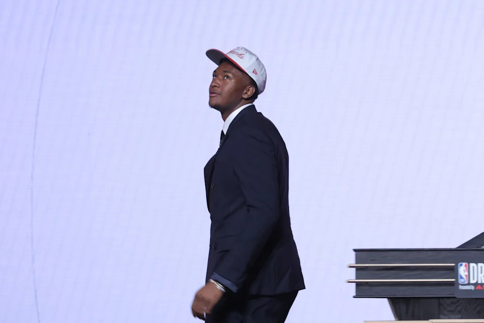 Derik Queen reacts on stage after being selected as the 13th pick by the Atlanta Hawks in the first round of the 2025 NBA DraftBrad Penner-Imagn Images
