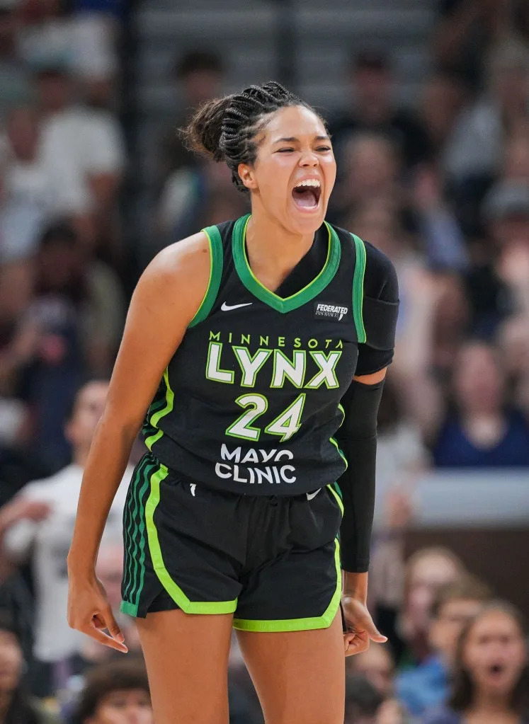 Napheesa Collier (24) celebrates a basket against the Las Vegas Aces in the second quarter at Target Center on July 25, 2025. Brad Rempel-Imagn Images