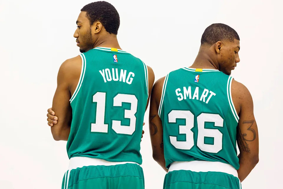 Sep 29, 2014; Waltham, MA, USA; Boston Celtics guard James Young (13) (left) and guard Marcus Smart (36) during media day at the Celtics practice facility. Mandatory Credit: David Butler II-USA TODAY Sports