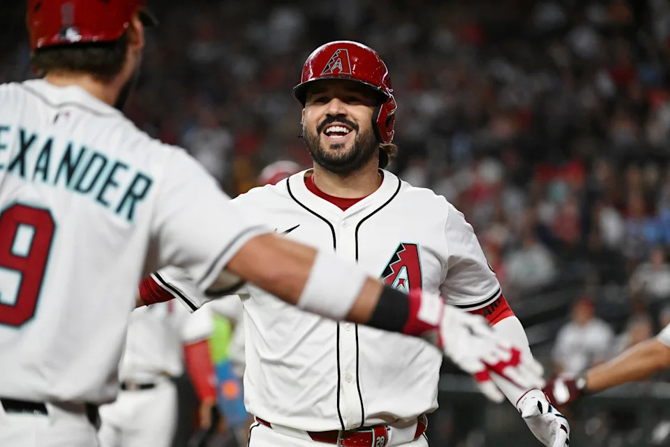 Suárez celebrates after hitting his 35th home run of the season on Sunday. (Norm Hall/Getty Images)