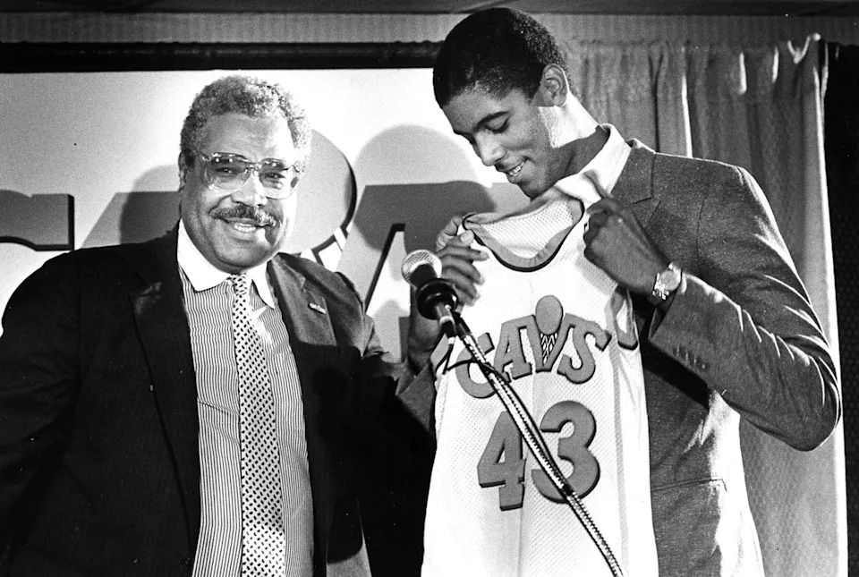 Cleveland Cavaliers general manager Wayne Embry, left, selected center Brad Daugherty with the first pick of the 1986 NBA draft.