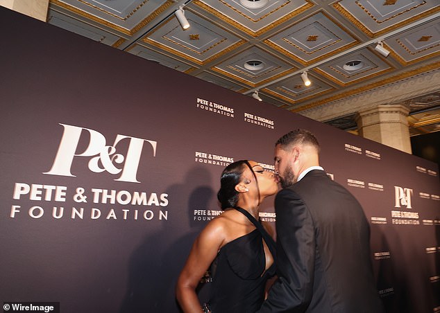 The Mavericks star planted a kiss on his girlfriend's lips before letting her have her moment