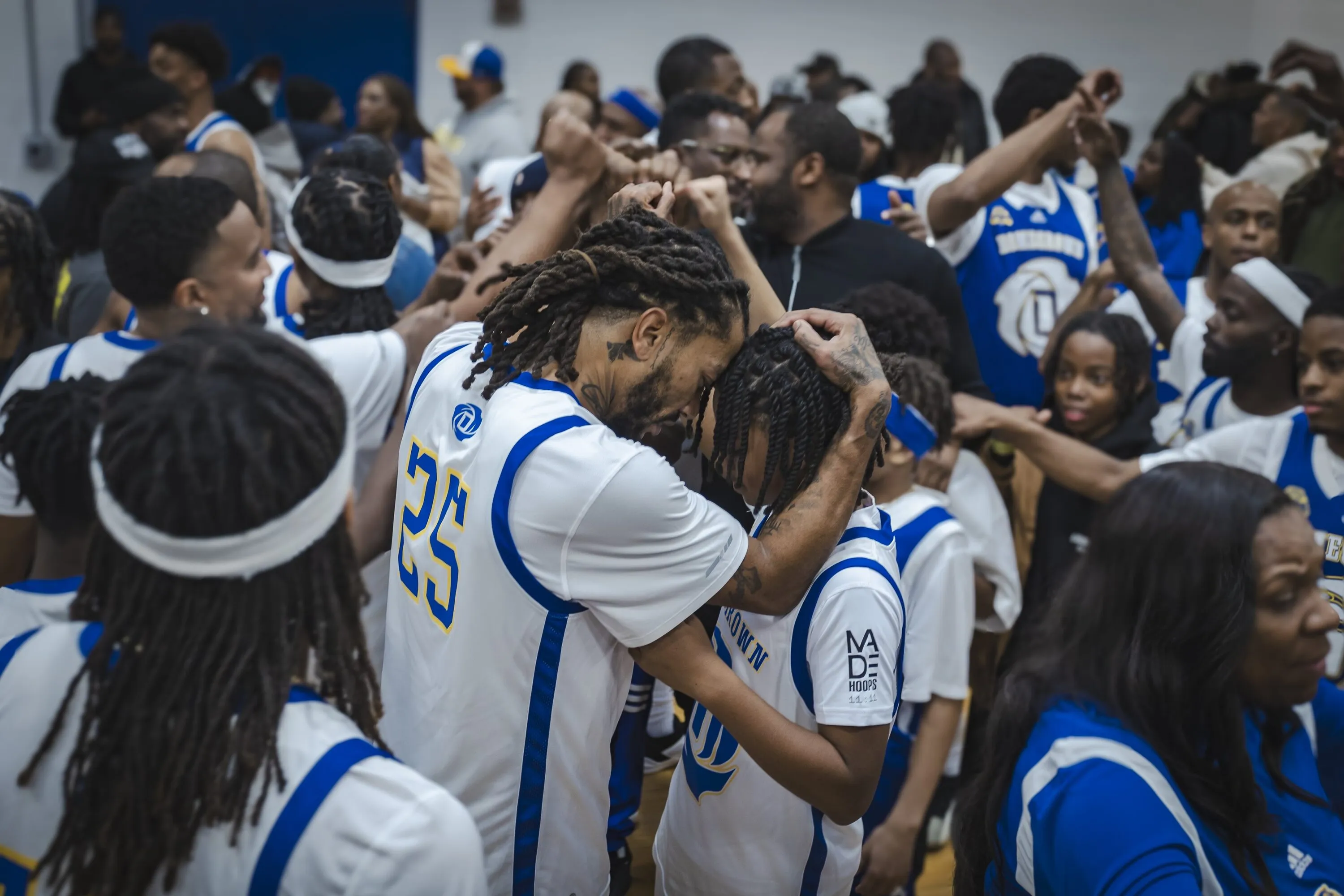 Derrick rose embracing his son.