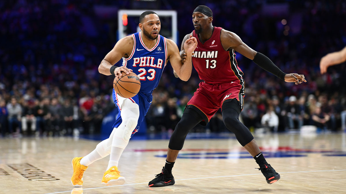 Philadelphia 76ers guard Eric Gordon (23) drives against Miami Heat center Bam Adebayo (13) in the fourth quarter at Wells Fargo Center.