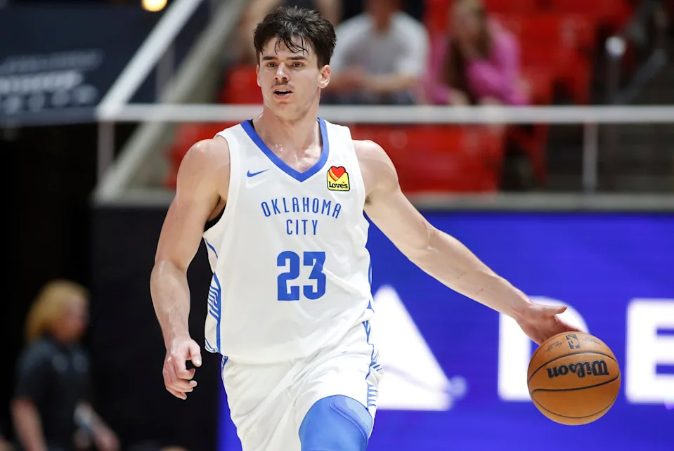 Brooks Barnhizer #23 of the Oklahoma City Thunder brings the ball up the court during the second half of their NBA Summer League game against the Memphis Grizzlies at the Jon M. Huntsman Center