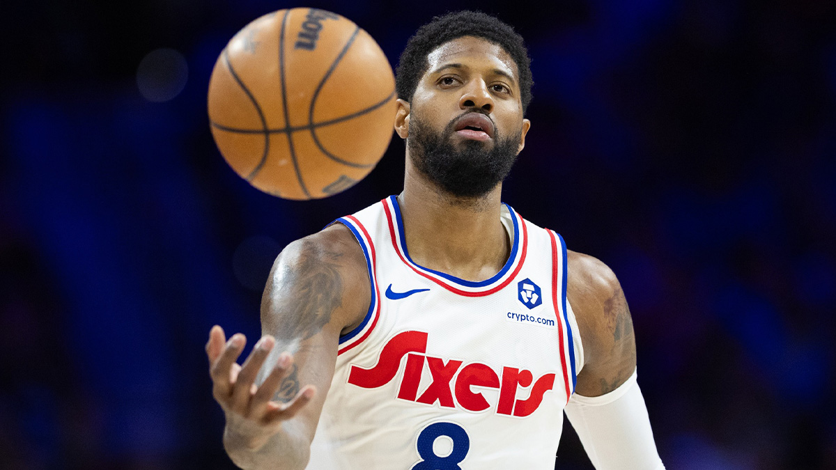 Philadelphia 76ers forward Paul George (8) catches a ball against the Golden State Warriors during the third quarter at Wells Fargo Center.