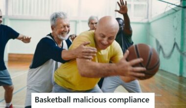 Adults playing basketball