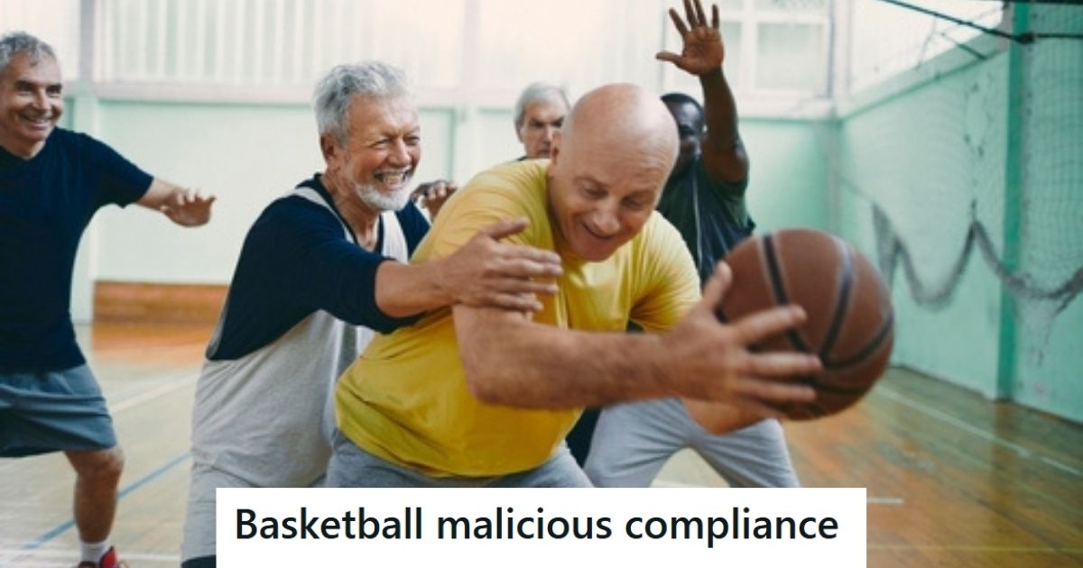 Adults playing basketball