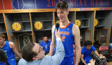 The world's tallest teen, 7-foot-9 center Olivier Rioux, gives football a try at Florida
