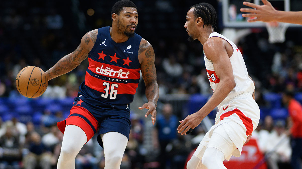 Washington Wizards guard Marcus Smart (36) handles the ball during the second quarter against the Toronto Raptors at Capital One Arena.