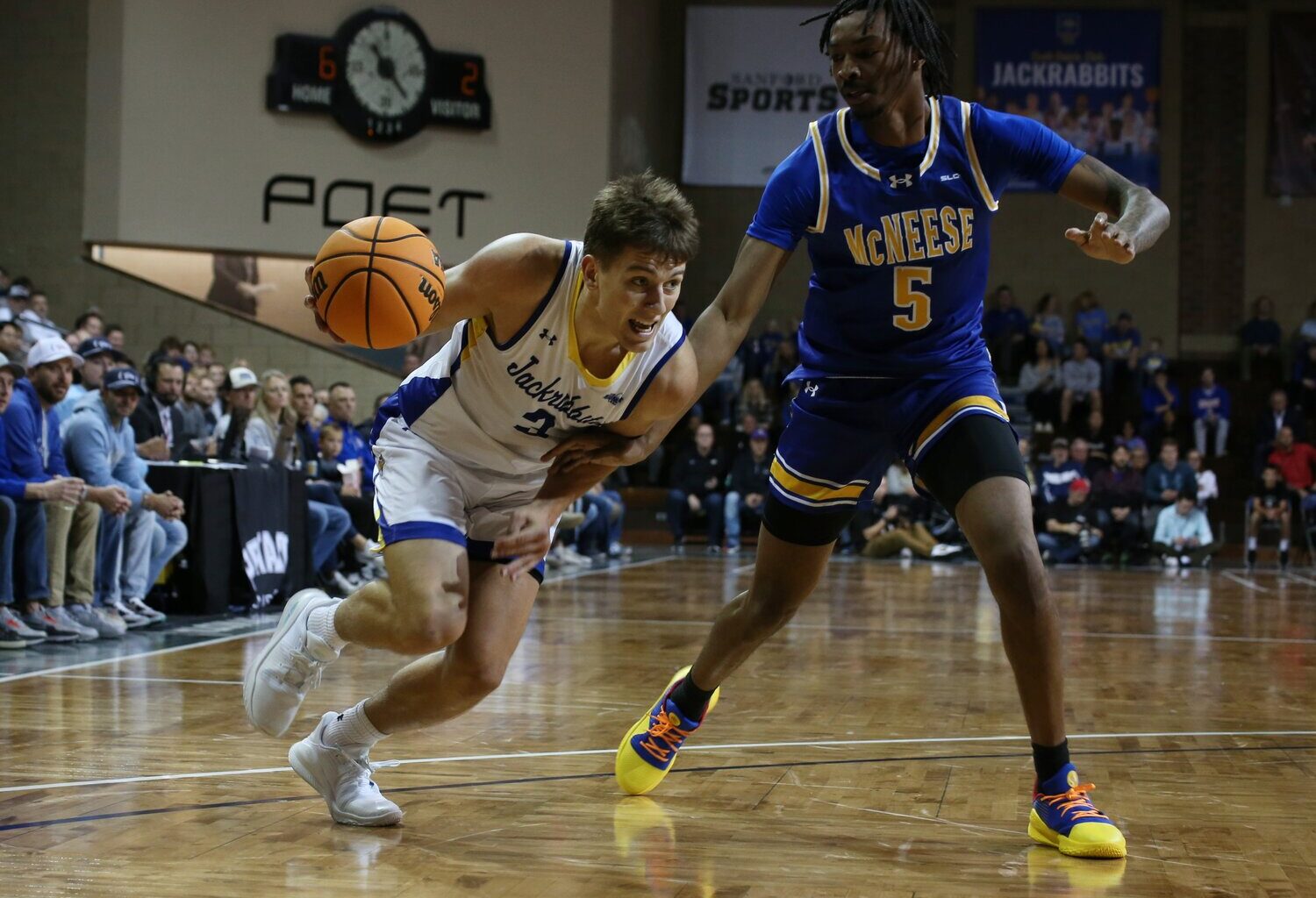 South Dakota State guard Joe Sayler gets past McNeese State