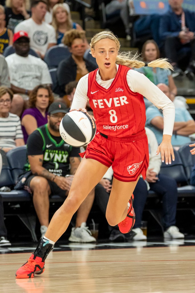 Indiana Fever guard Sophie Cunningham (8) drives to the basket against the Minnesota Lynx in the first half during the Commissioner's Cup final at Target Center.