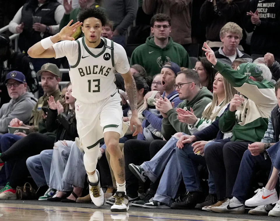 Milwaukee Bucks guard Ryan Rollins (13) reacts after hitting a three-point basket during the first half of their game against the Atlanta Hawks Sunday, March 30, 2025 at Fiserv Forum in Milwaukee, Wisconsin.