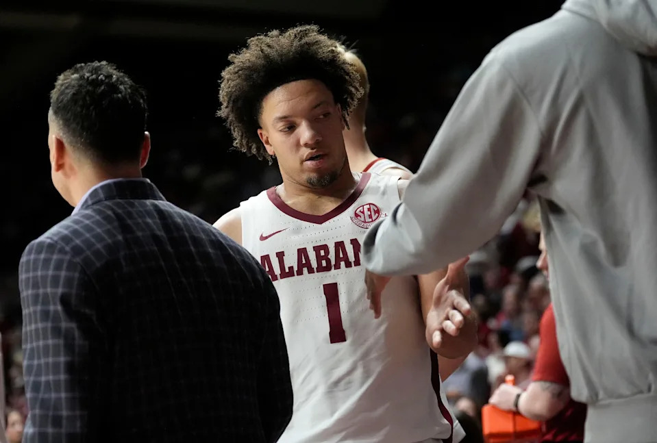 Feb 1, 2025; Tuscaloosa, AL, USA; Alabama guard Mark Sears (1) is congratulated as he leaves the floor near the end of the game at Coleman Coliseum. Alabama downed Georgia 90-69. Mandatory Credit: Gary Cosby Jr.-Tuscaloosa News
