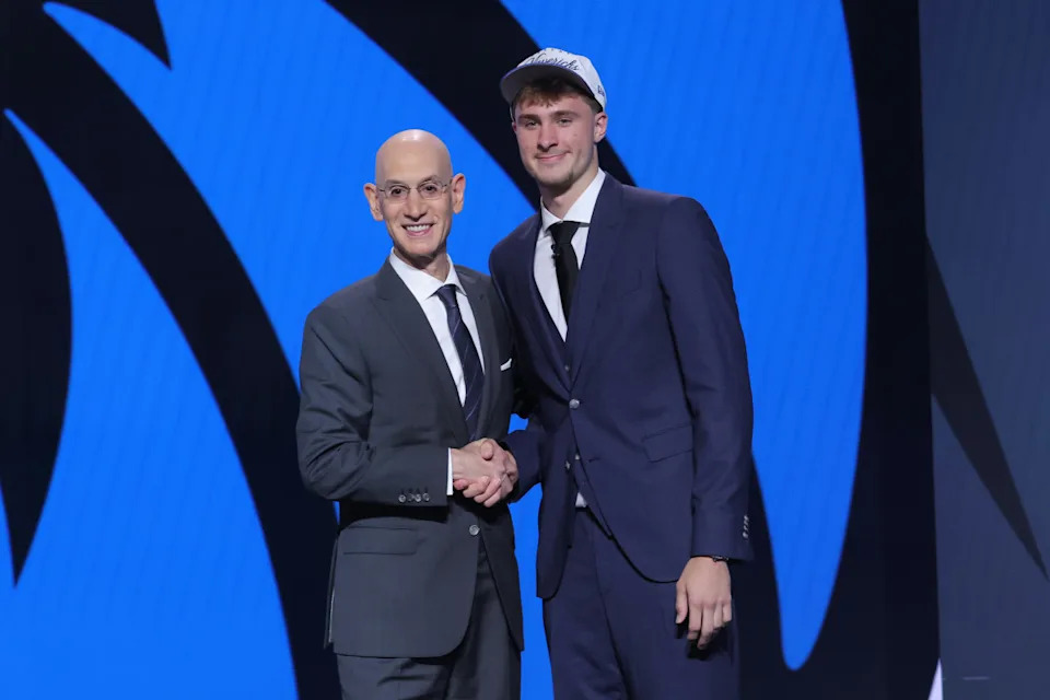 Dallas Mavericks forward Cooper Flagg and NBA commissioner Adam Silver.Brad Penner-Imagn Images