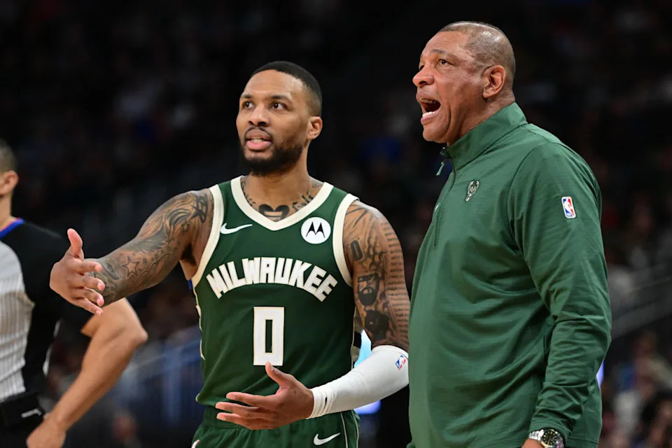 Milwaukee Bucks head coach Doc Rivers and guard Damian Lillard (0)Benny Sieu-Imagn Images
