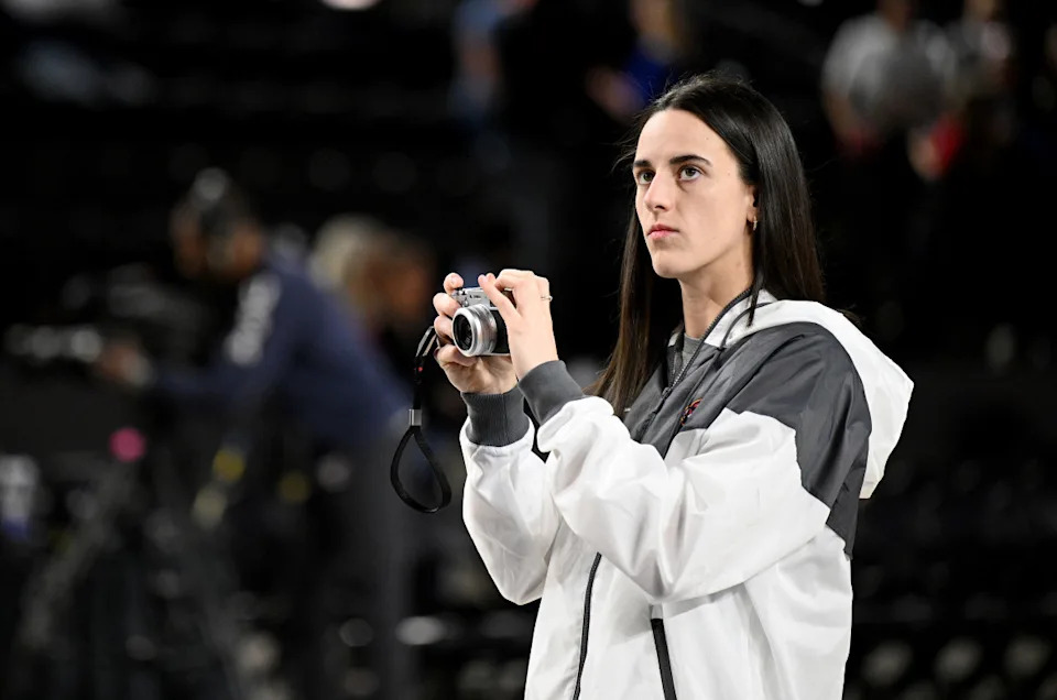 BALTIMORE, MARYLAND - MAY 28: Caitlin Clark #22 of the Indiana Fever takes a photo before the game against the Washington Mystics at CFG Bank Arena on May 28, 2025 in Baltimore, Maryland. (Photo by Greg Fiume/Getty Images)Greg Fiume/Getty Images