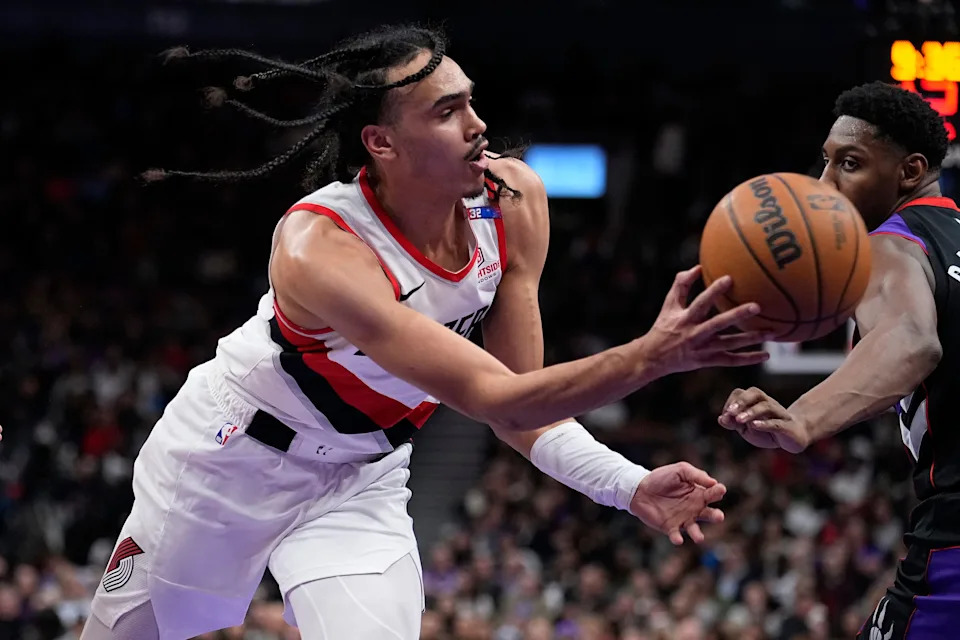 Apr 3, 2025; Toronto, Ontario, CAN; Portland Trail Blazers guard Dalano Banton (5) passes the ball against the Toronto Raptors during the second half at Scotiabank Arena. Mandatory Credit: John E. Sokolowski-Imagn Images