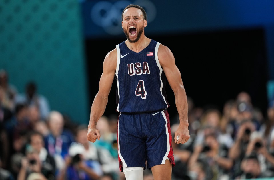 Stephen Curry of Team USA celebrates during a basketball game.