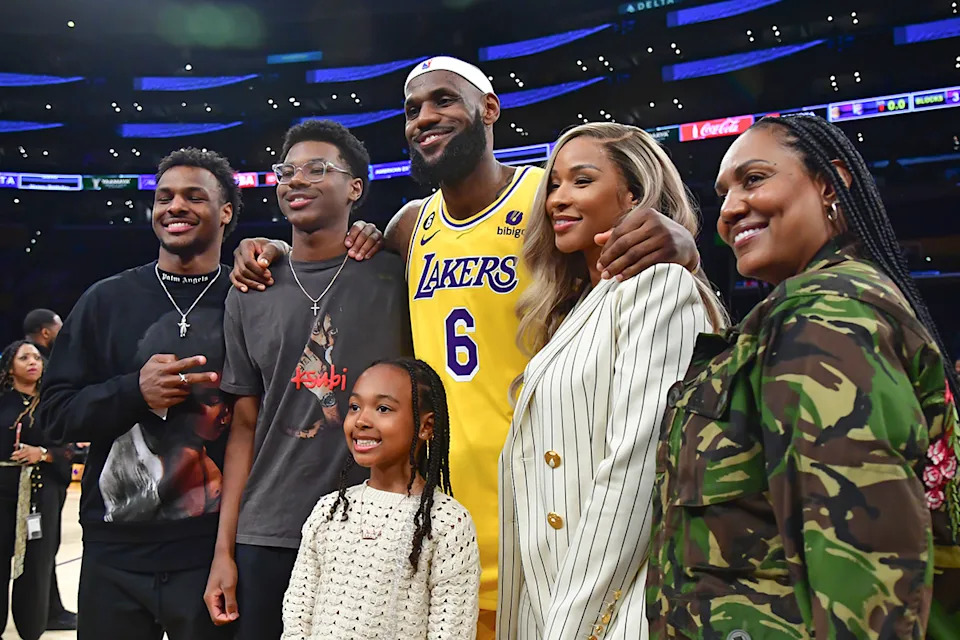 Los Angeles Lakers forward LeBron James (6) with his sons Bronny and Bryce Maximus, daughter Zhuri, wife Savannah and mother Gloria.Gary A&period; Vasquez-Imagn Images