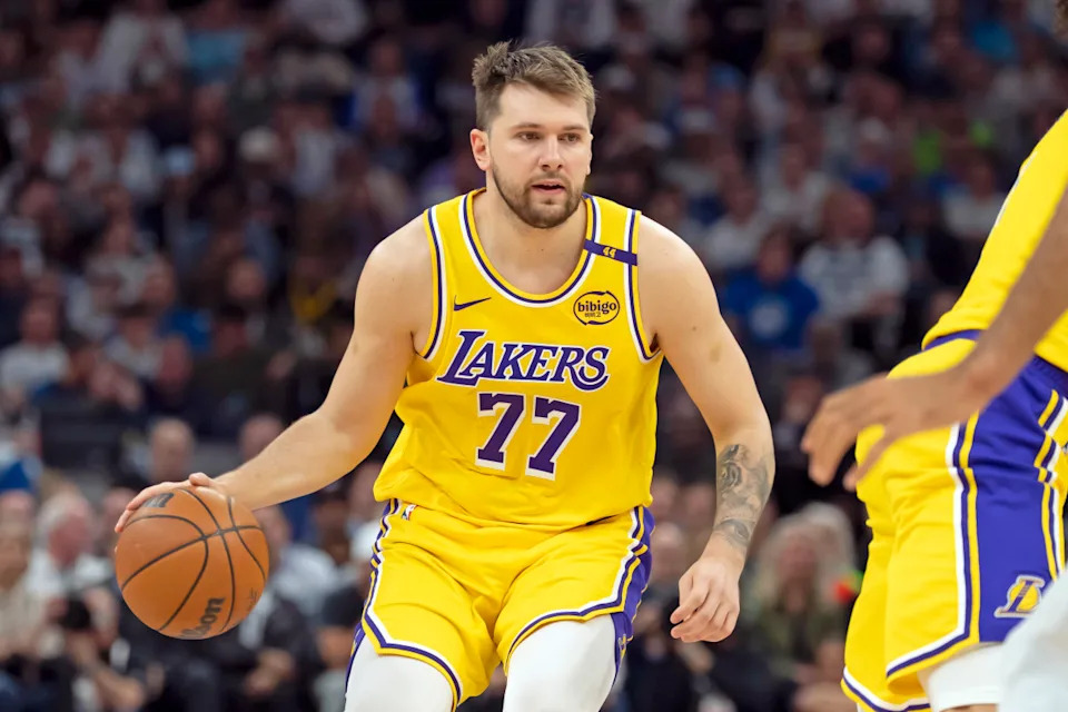 Los Angeles Lakers guard Luka Doncic (77) dribbles the ball against the Minnesota Timberwolves during Game 3 of the first round of the 2024 NBA Playoffs at Target Center.Jesse Johnson-Imagn Images