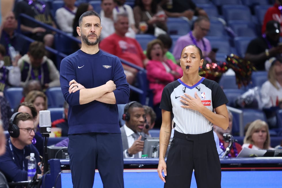 New Orleans Pelicans associate head coach James Borrego talks to a referee in the second half...