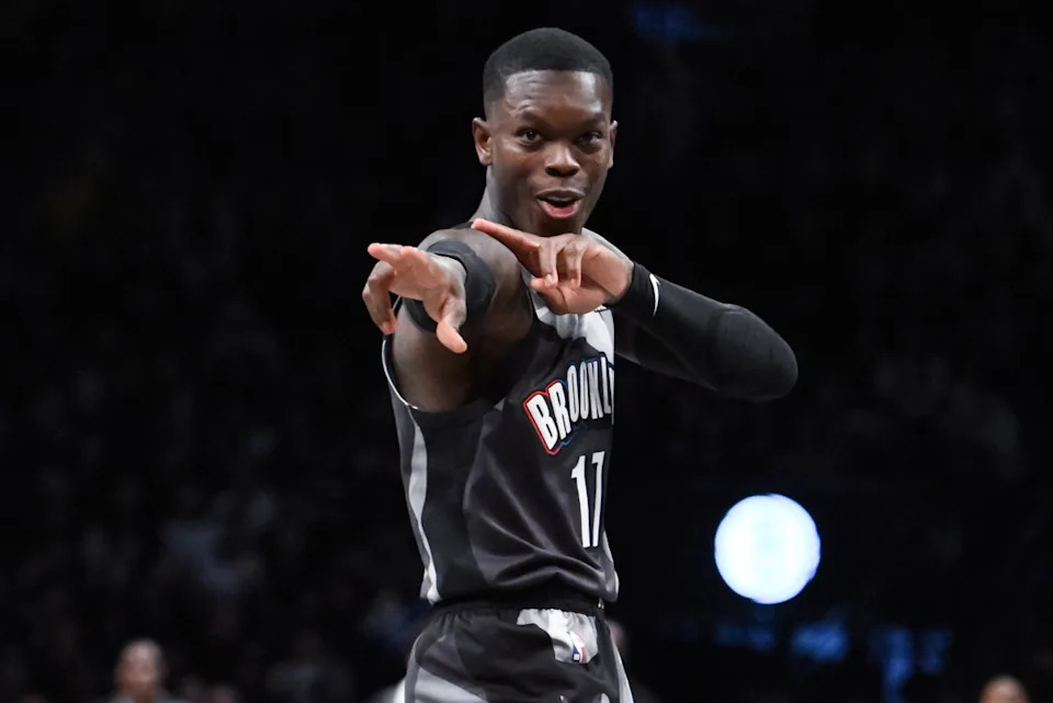 Brooklyn Nets guard Dennis Schroder celebrating on the court.© John Jones-Imagn Images