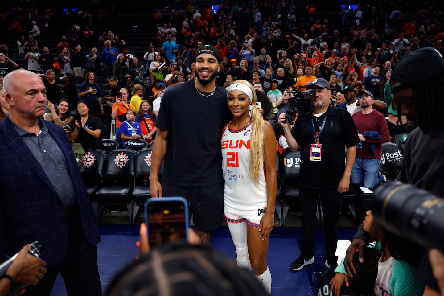 When the Sun played at TD Garden last August, Celtics star Jayson Tatum was in attendance, posing with DiJonai Carrington.