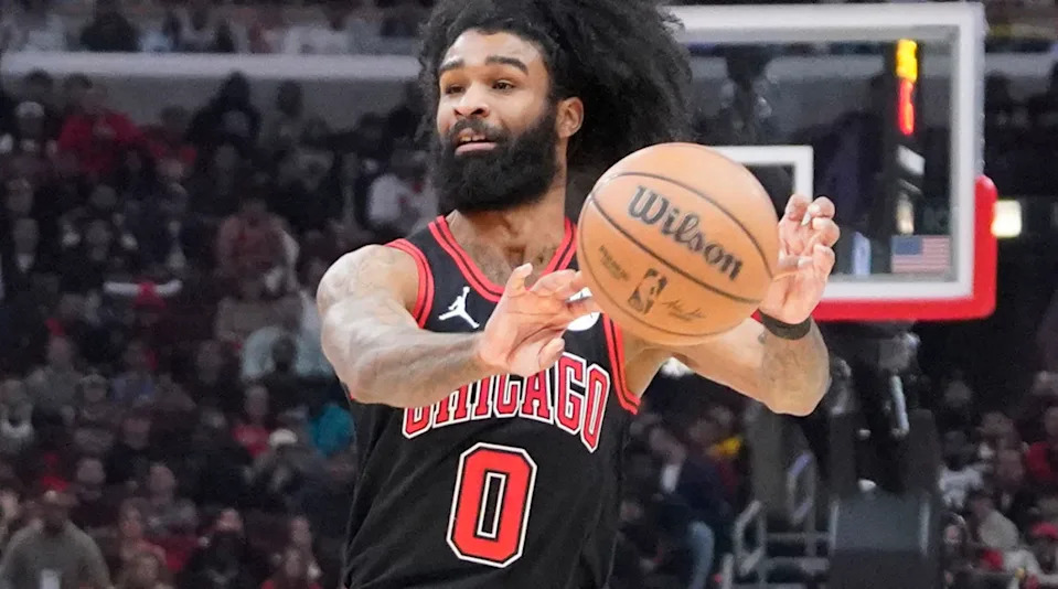 Chicago Bulls guard Coby White passes during a play-in tournament game against the Atlanta Hawks at United Center on April 17, 2024.David Banks-Imagn Images