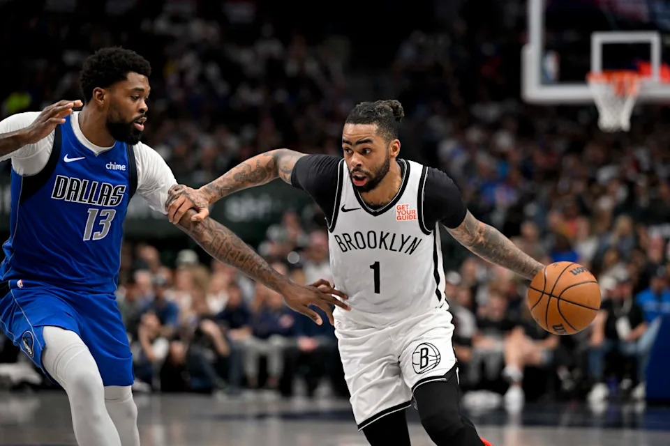 Former Brooklyn Nets guard D'Angelo Russell (1) and Dallas Mavericks forward Naji Marshall (13).© Jerome Miron-Imagn Images