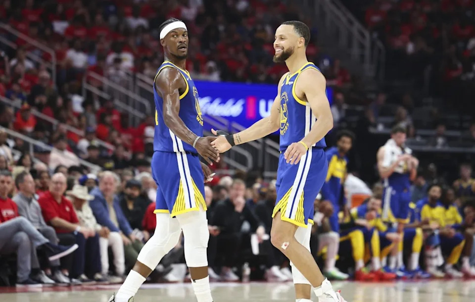 Golden State Warriors guard Stephen Curry (30) celebrates with forward Jimmy Butler III (10) after a play during the second quarter against the Houston Rockets at Toyota Center. Mandatory Credit: Troy Taormina-Imagn ImagesCredit: Troy Taormina-Imagn Images