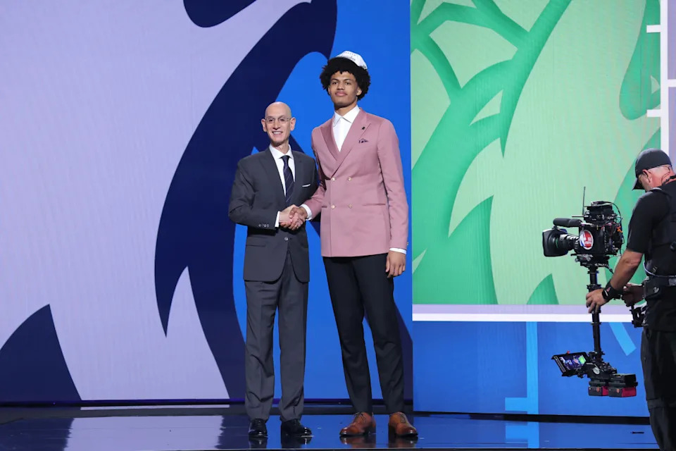 Jun 25, 2025; Brooklyn, NY, USA; Joan Beringer stands with NBA commissioner Adam Silver after being selected as the 17th pick by the Minnesota Timberwolves in the first round of the 2025 NBA Draft at Barclays Center. Mandatory Credit: Brad Penner-Imagn ImagesBrad Penner-Imagn Images