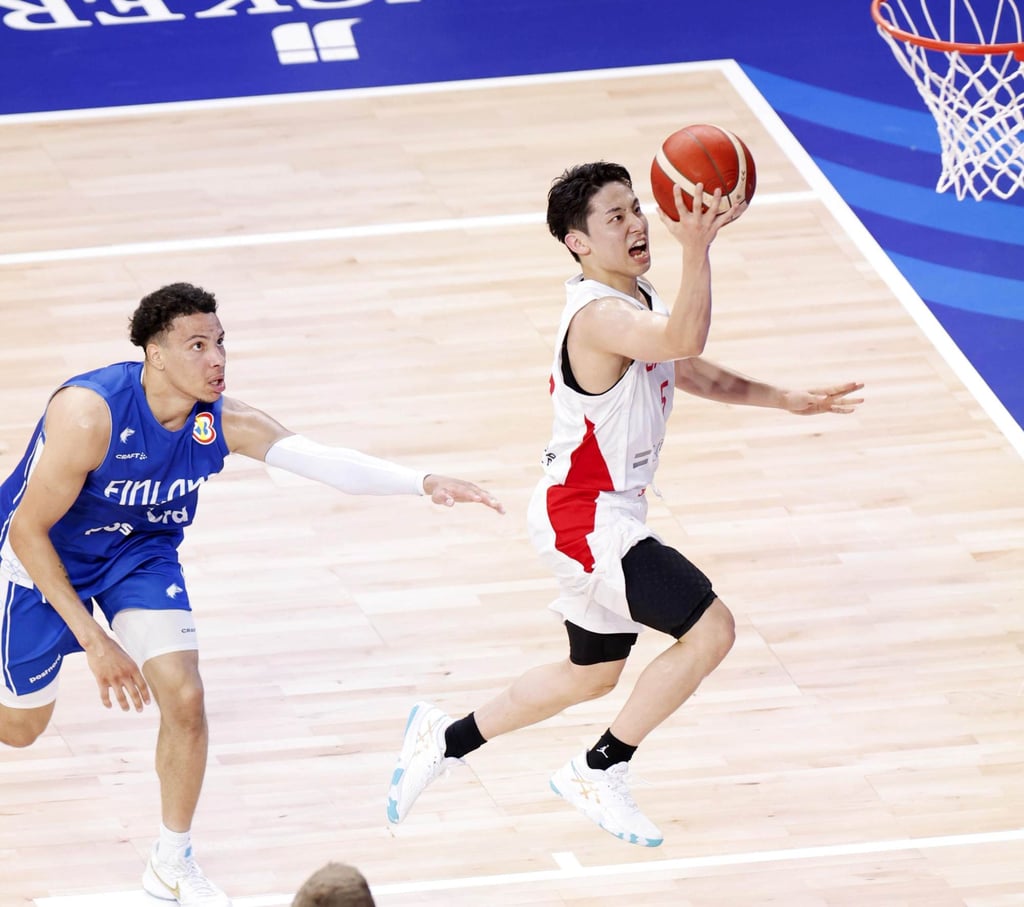 Japan’s Yuki Kawamura puts up a shot against Finland during their World Cup game in 2023. Photo: Kyodo