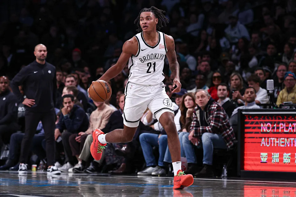 Nov 13, 2024; Brooklyn, New York, USA; Brooklyn Nets forward Noah Clowney (21) dribbles up court during the second half against the Boston Celtics at Barclays Center. Mandatory Credit: Vincent Carchietta-Imagn Images
