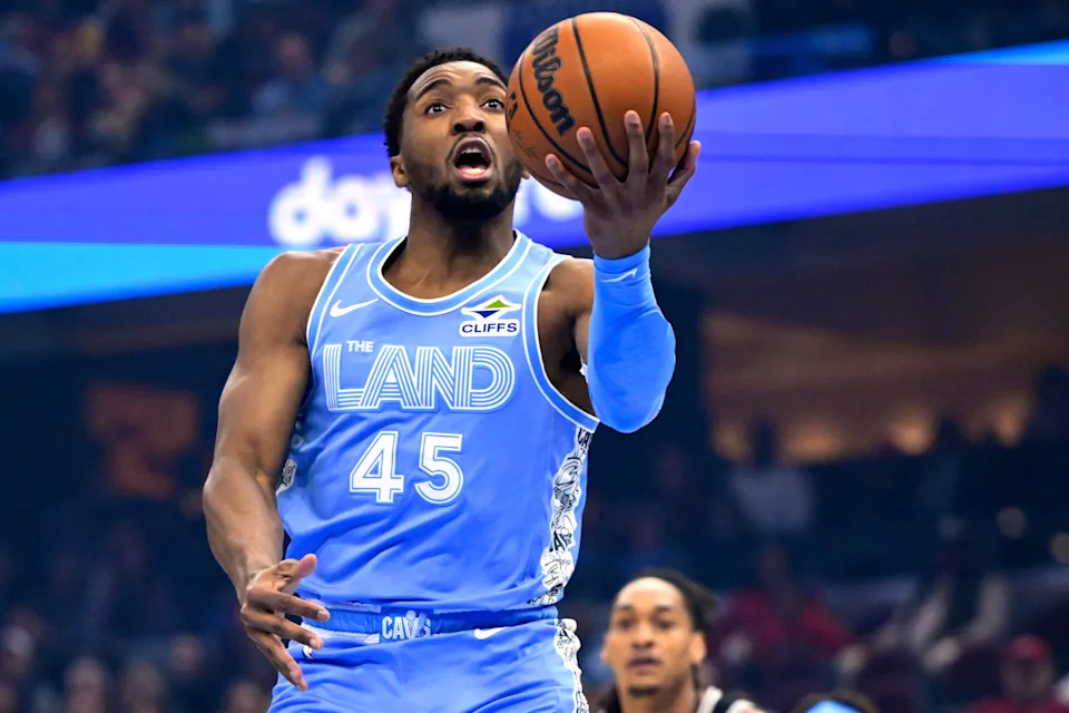 Cleveland Cavaliers guard Donovan Mitchell (45) drives to the basket against the San Antonio Spurs on March 27, 2025, in Cleveland, Ohio.