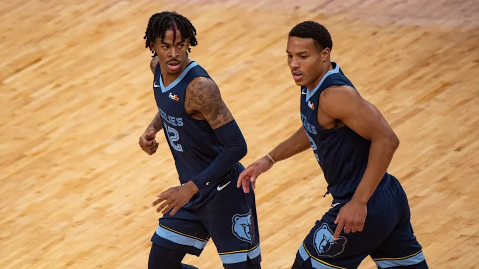 Dec 26, 2020; Memphis, Tennessee, USA; Memphis Grizzlies guard Ja Morant (12) and Memphis Grizzlies guard Desmond Bane (22) during the game against the Atlanta Hawks at FedExForum. Mandatory Credit: Justin Ford-Imagn Images© Justin Ford-Imagn Images