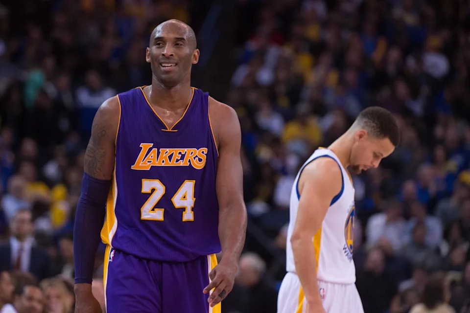Los Angeles Lakers legend Kobe Bryant (24) and Golden State Warriors guard Stephen Curry (30).Kyle Terada-Imagn Images
