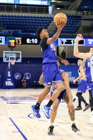Jeff Haynes/NBAE via Getty Tahaad Pettiford during the 2025 NBA Draft Combine in Chicago on May 14, 2025