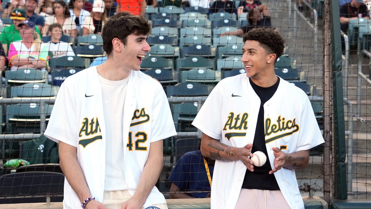 Sacramento Kings pick Nique Clifford throws first pitch at A's game
