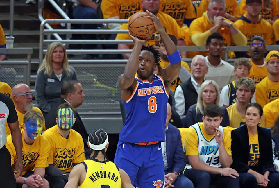 New York Knicks forward OG Anunoby (8) shoots a three point basket over Indiana Pacers guard Andrew Nembhard (2) during the first quarter of game three of the eastern conference finals for the 2025 NBA Playoffs at Gainbridge Fieldhouse. <strong><em>Mandatory Credit: Trevor Ruszkowski-Imagn Images</em></strong>Trevor Ruszkowski-Imagn Images